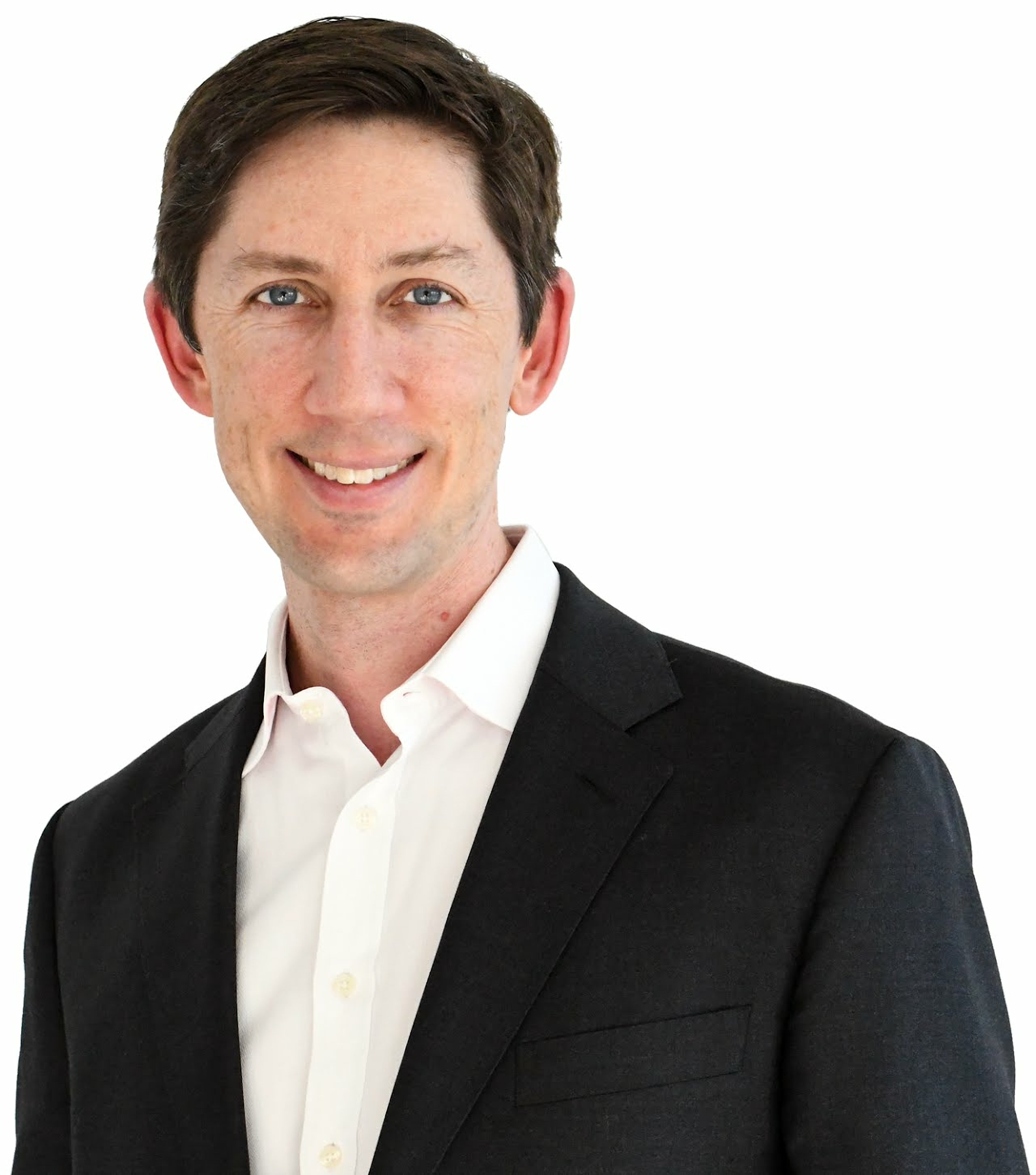 Professional headshot of senior structural engineer Lonnie Pack in a dark blazer and white shirt, conveying scholarly authority